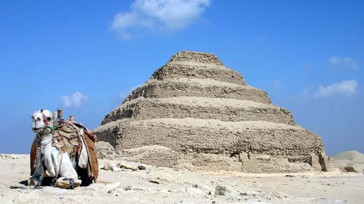 The Step Pyramid of Djoser at Saqqara with a camel.